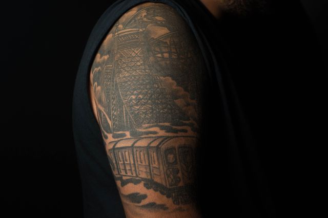 Adil Ali, of East Elmhurst, got the top of his arm covered in a Queens scene including the 7 train, the Queensboro Bridge, the Unisphere and the World's Fair Observation Towers. The tattoo was done by Jose Soto.<br>